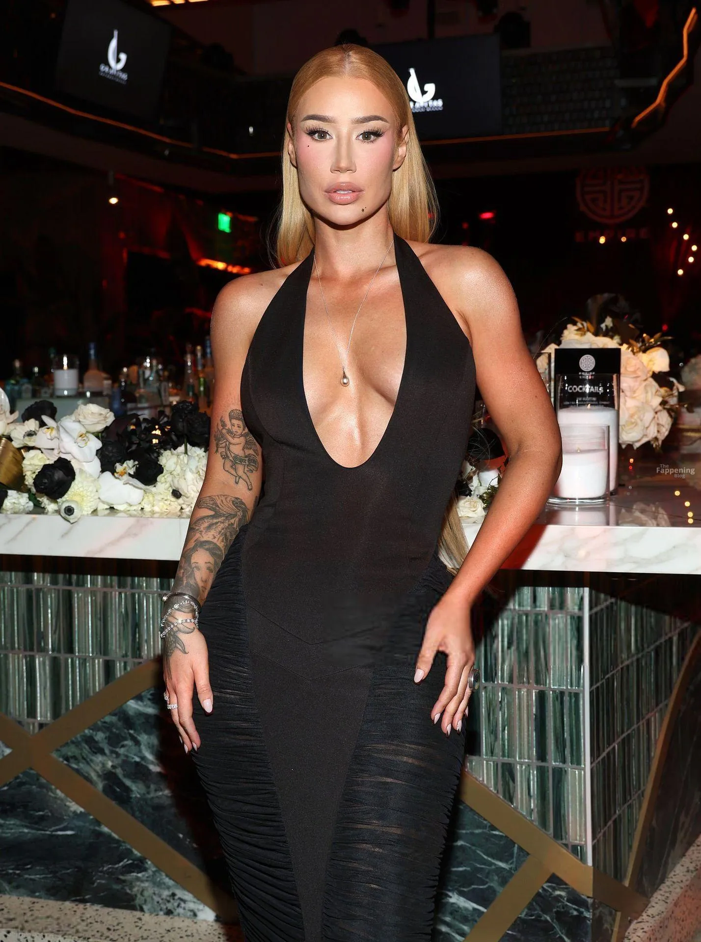 Iggy Azalea Shows Off Her Cleavage at the EMPIRE 2026 Party (14 Photos)
