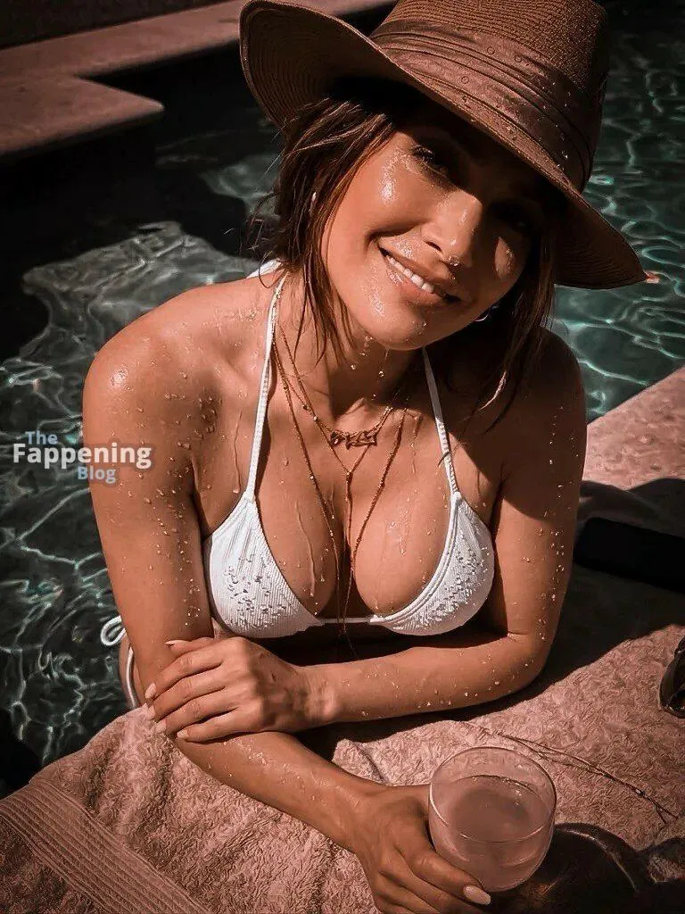 Jennifer Lopez Shows Off Her Sexy Bikini Body in a Pool Shoot (8 Photos)