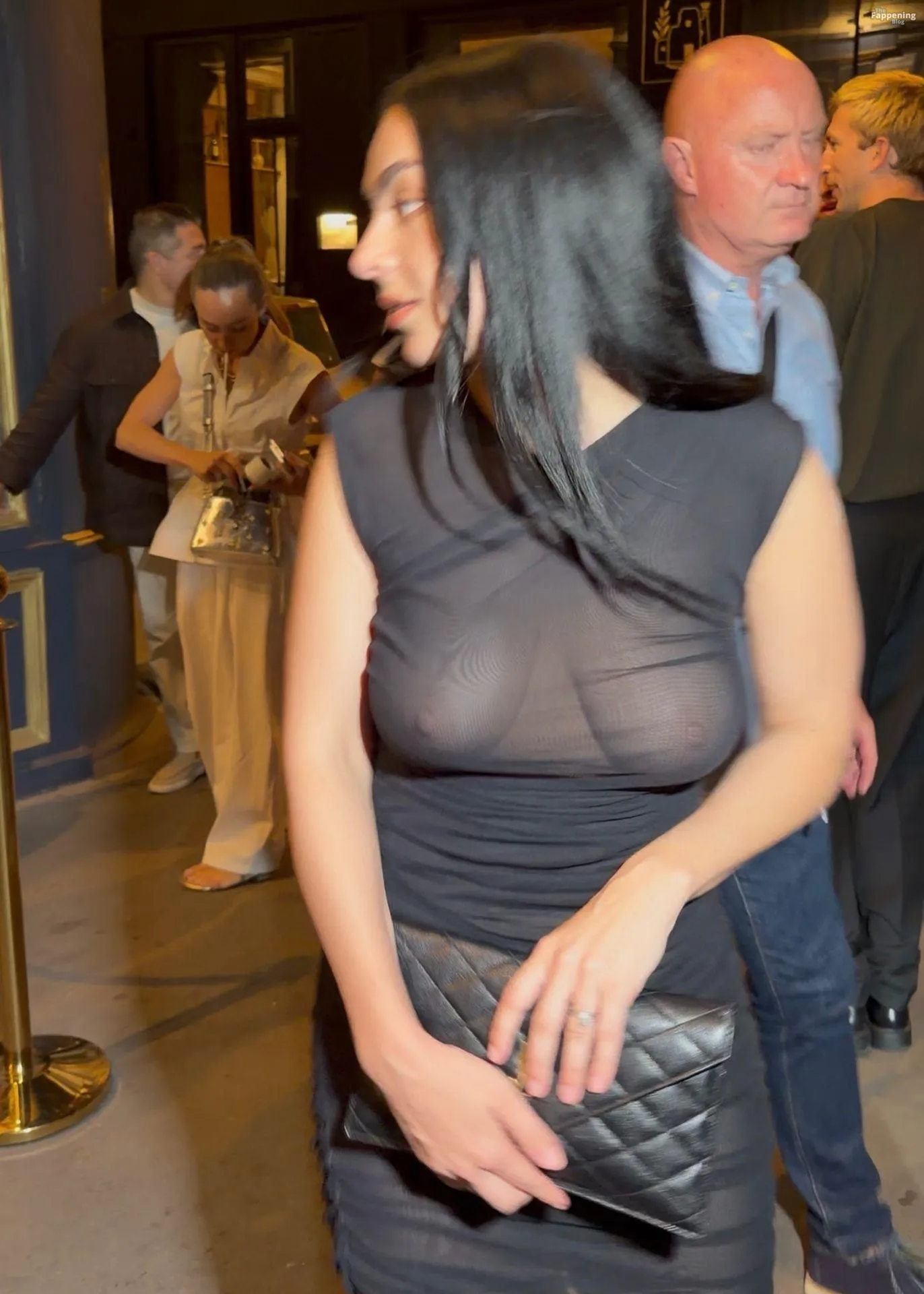 Charli XCX Flashes Her Nude Tits After the Saint Laurent Show in Paris (8 Photos)