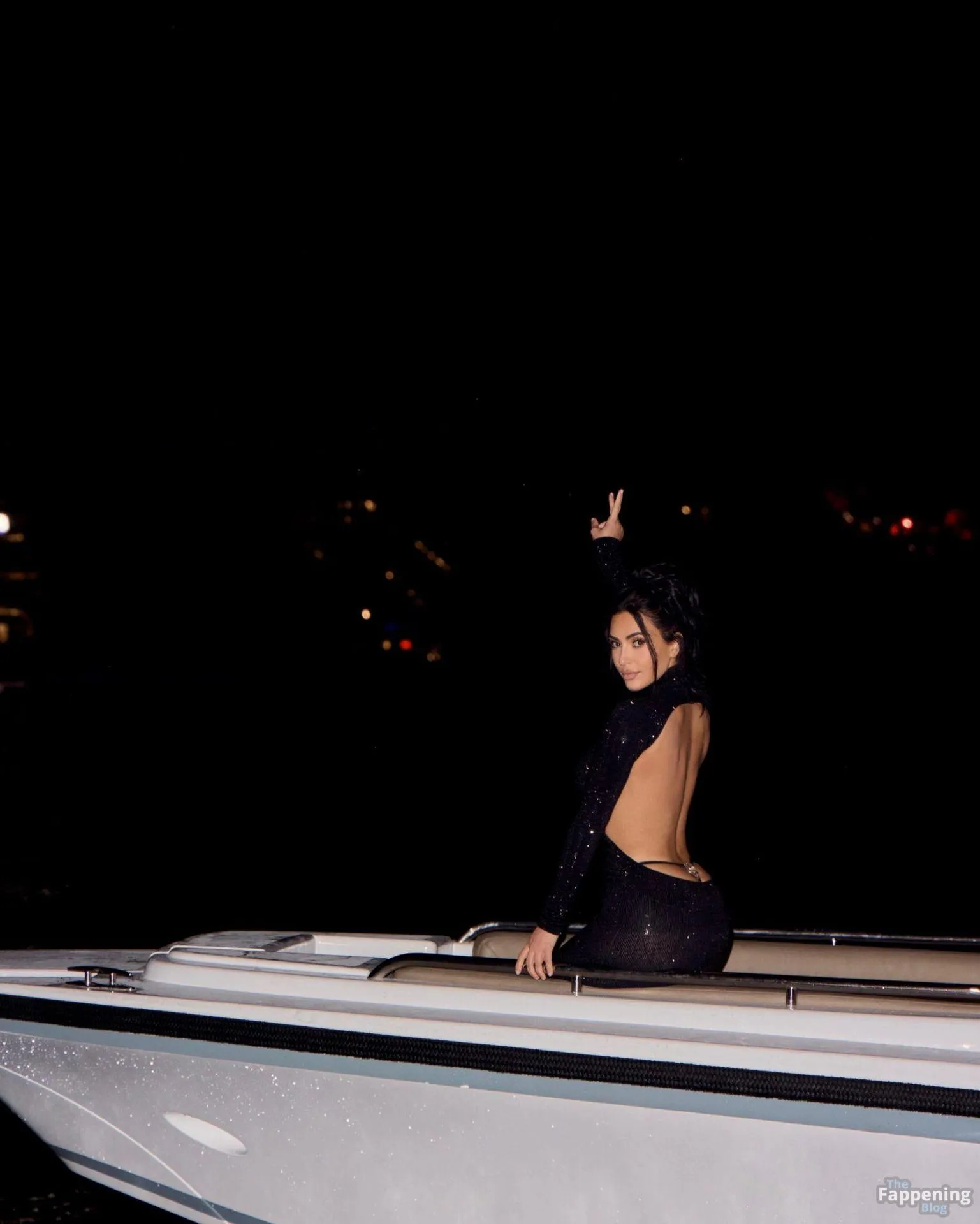 Kim Kardashian Shows Off Her Sideboob & Booty in a New Yacht Shoot (8 Photos)